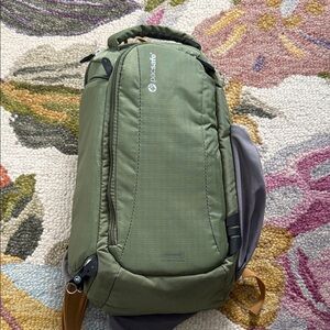 Pacsafe Olive Green Anti-Theft Camera Sling Style Backpack Like New